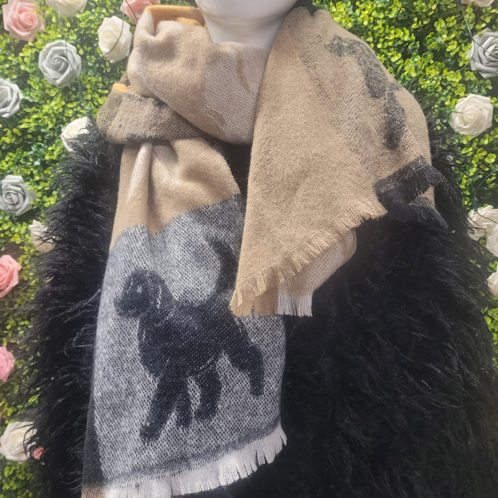 Scarf with a dog pattern draped over a mannequin against a floral and green leafy background