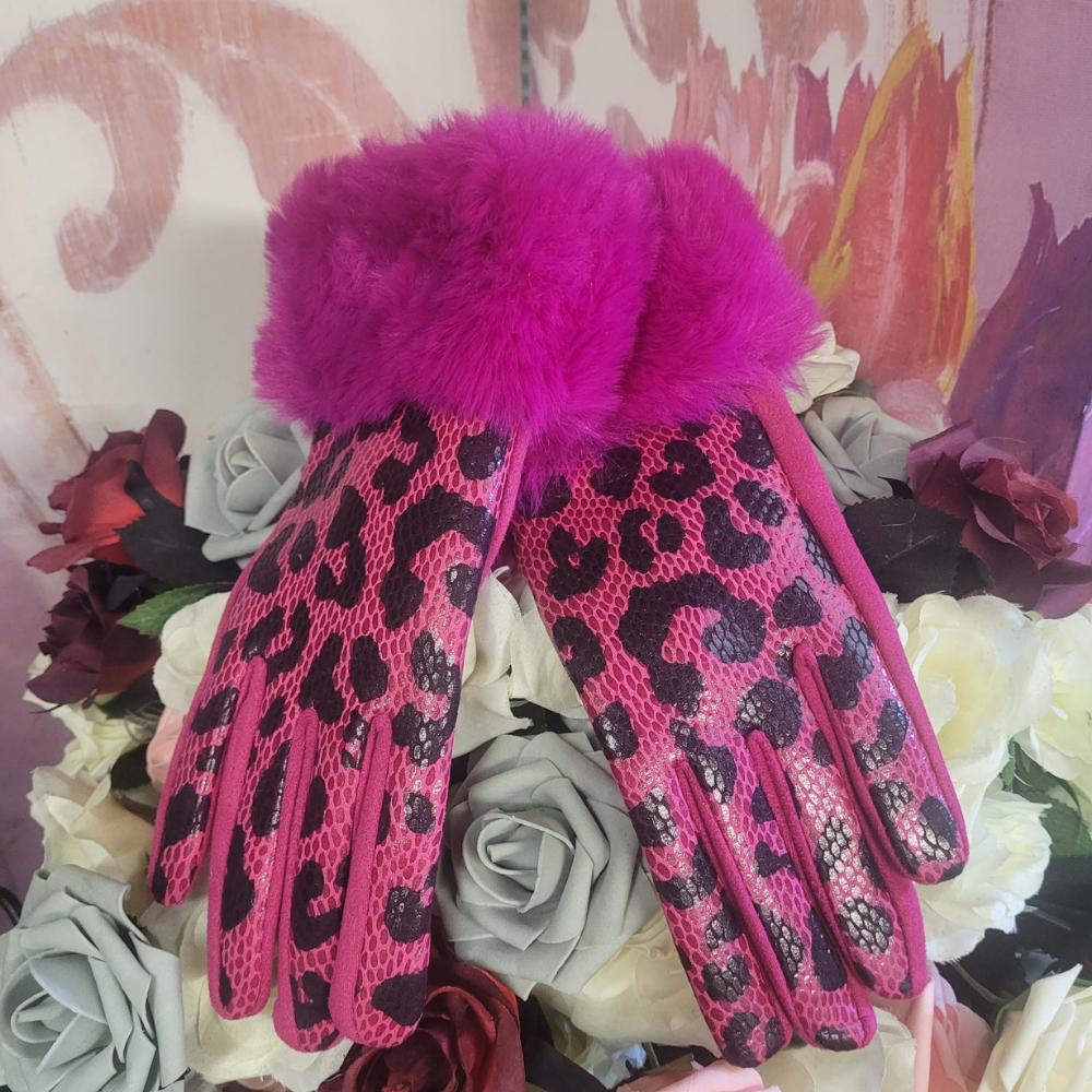 Pink leopard print gloves with purple fur cuffs on a floral background