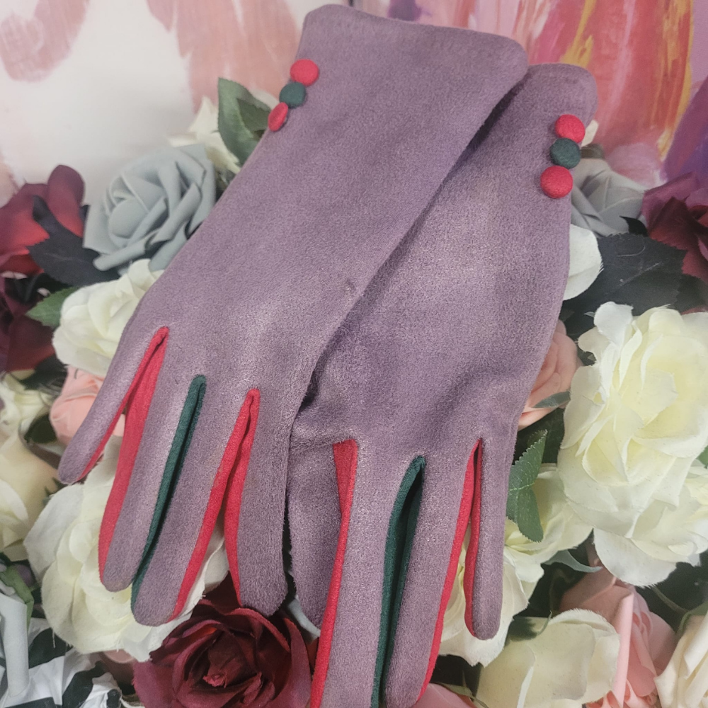 Purple gloves with red and green accents on a floral background