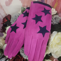 Pink gloves with star patterns on a floral background