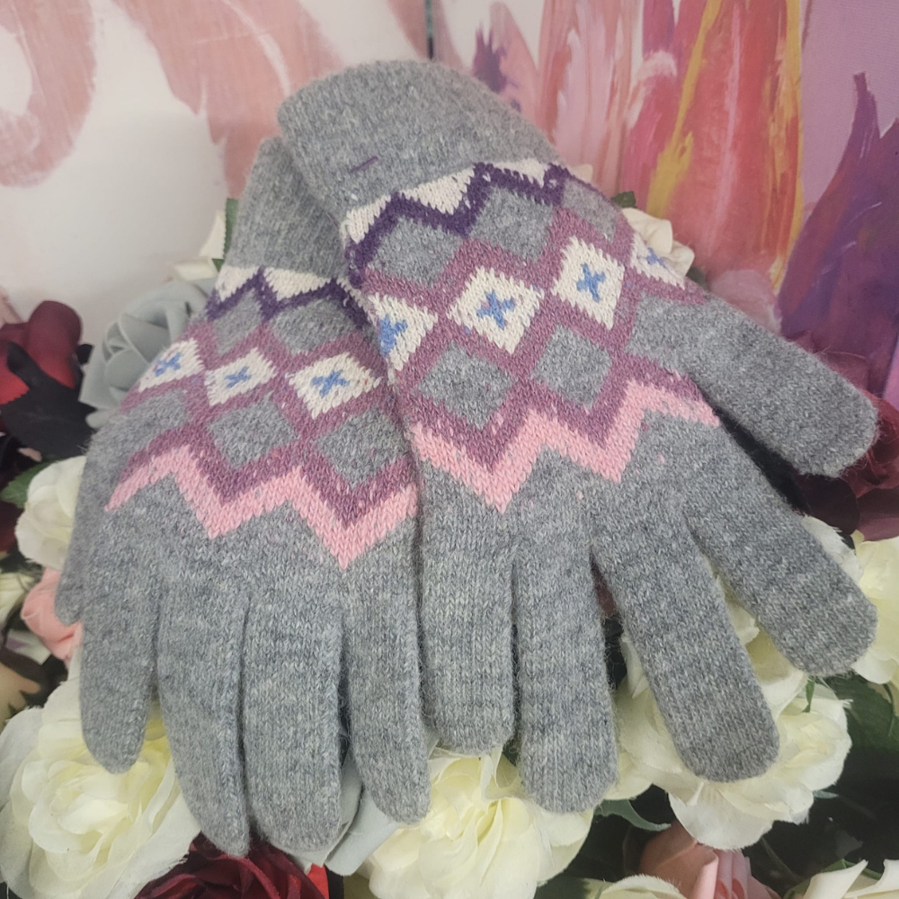 Gray gloves with a pattern on a floral background