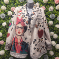 Leopard print jacket with artistic design on a mannequin against a floral background