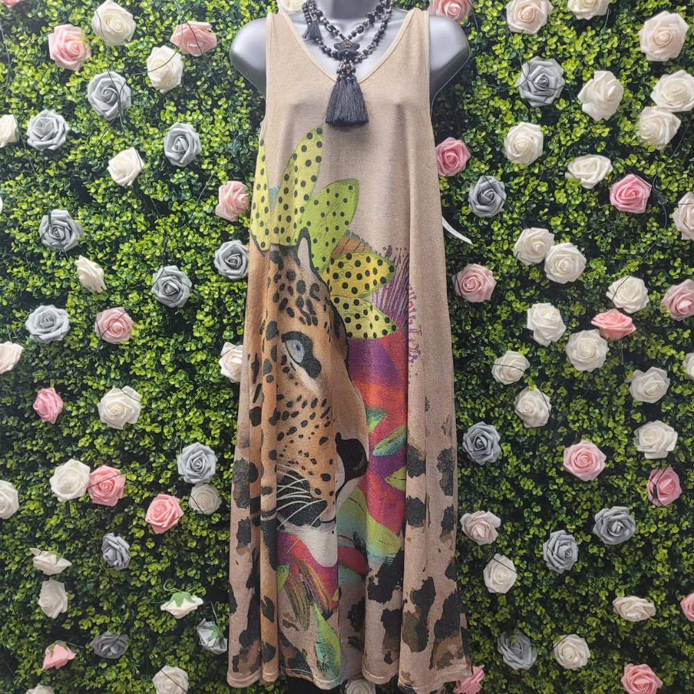 Gold Maxi dress depicting a leopard with a floral crown on a greenery backdrop